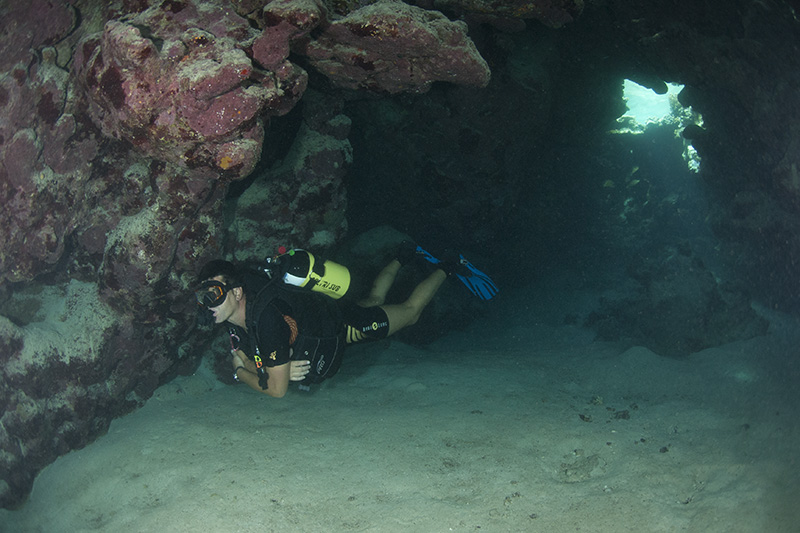 Divers in Cave