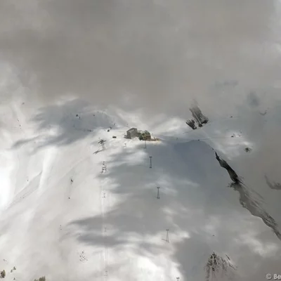 Ski lift below clouds