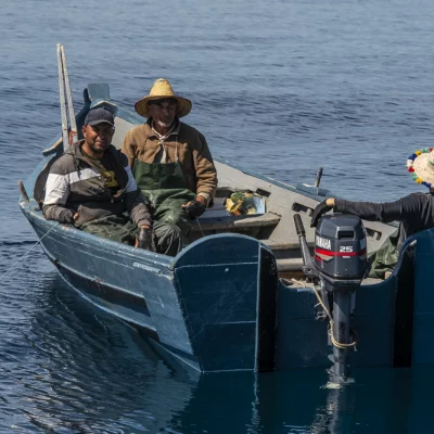 Three Moroccan fishermen in boat