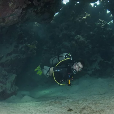 Divers in Cave