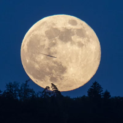 Full Moon Rising with Airplane